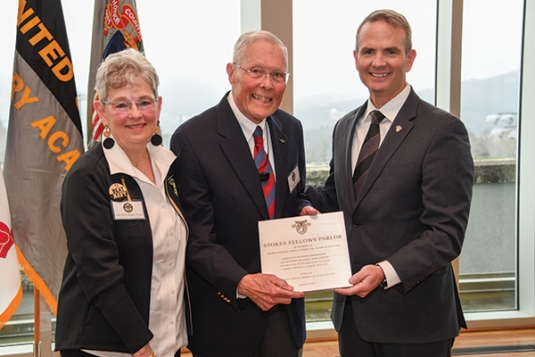 COL (R) Mark Bieger ’91, President and CEO of the West Point Association of Graduates, presents a commemorative plaque.