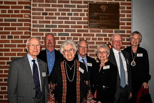 Marcia H. Randall, surviving spouse of Robert Randall ’56; Peter Krause ’67; Bob Carpenter ’67; and Alan and Florence Salisbury ’58 posing with the Egner Hall renovation plaque.