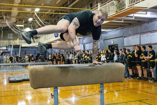 Cadets Push Themselves to Their Physical Limit During the Indoor Obstacle Course Test