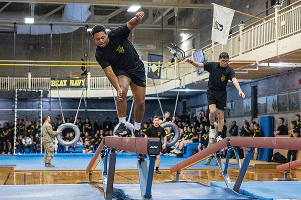 Cadets Push Themselves to Their Physical Limit During the Indoor Obstacle Course Test